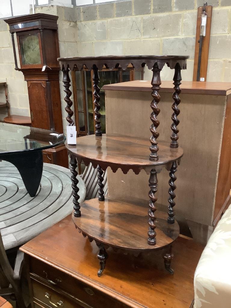 A Victorian rosewood oval three tier whatnot, width 48cm, depth 34cm, height 81cm